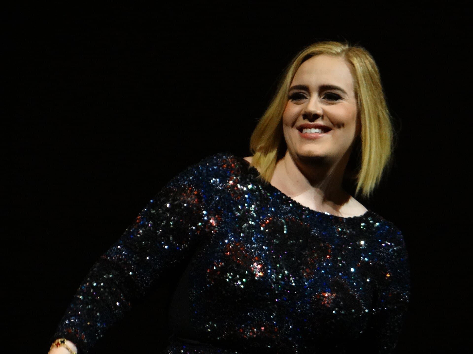 Adele performing on stage during her 2016 tour