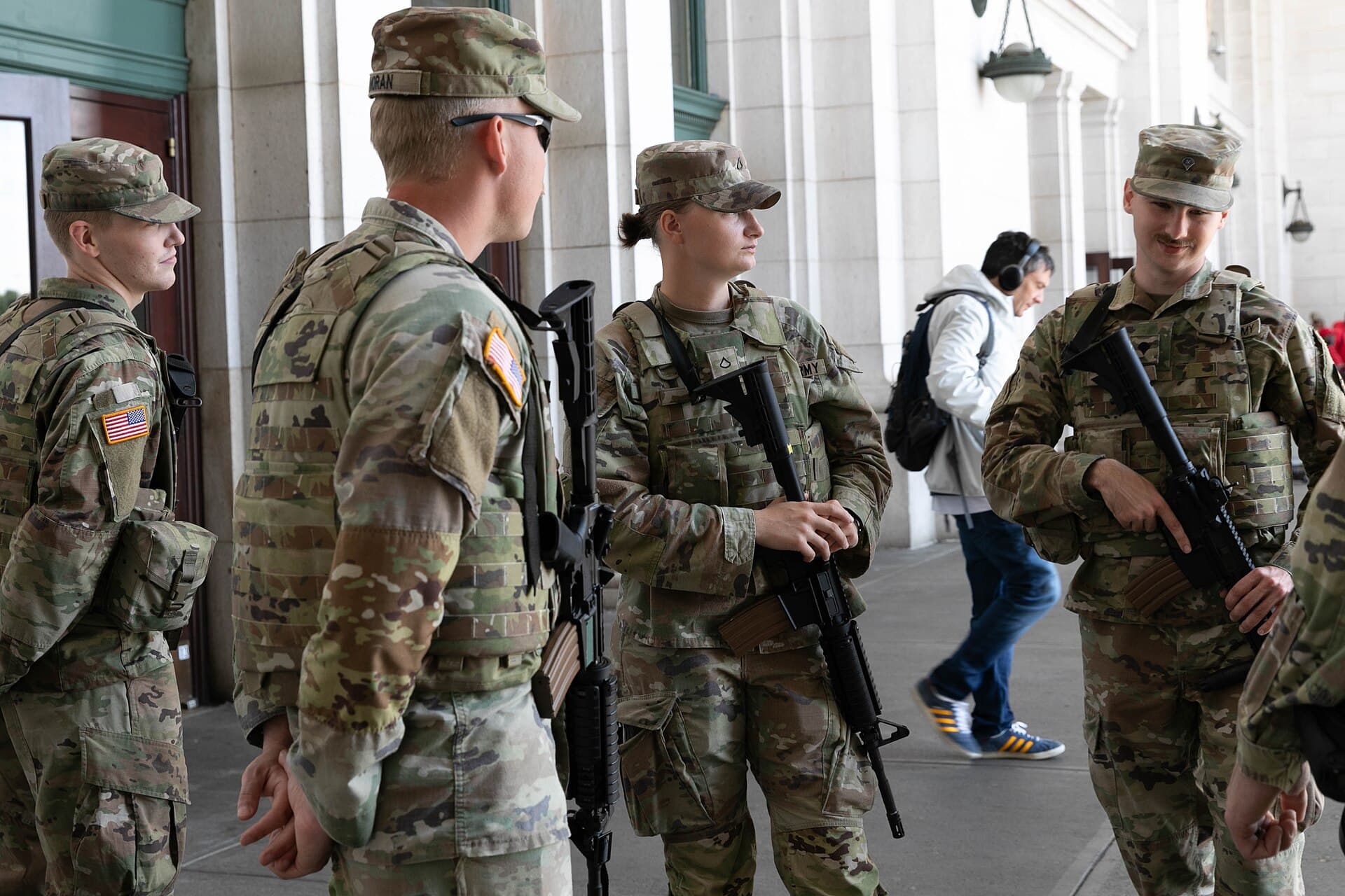 Armed West Virginia National Guard soldiers on patrol outside Union Station in Washington, D.C.