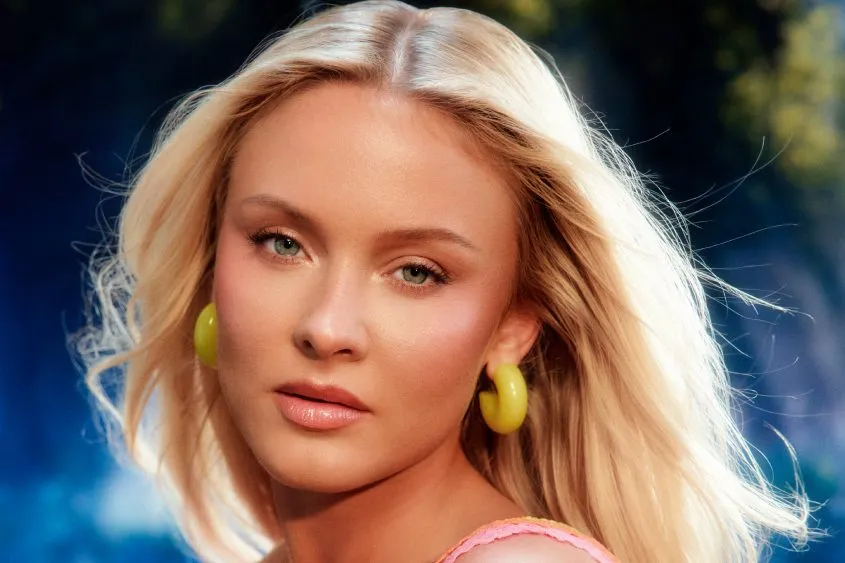 Zara Larsson performing live on stage during a concert